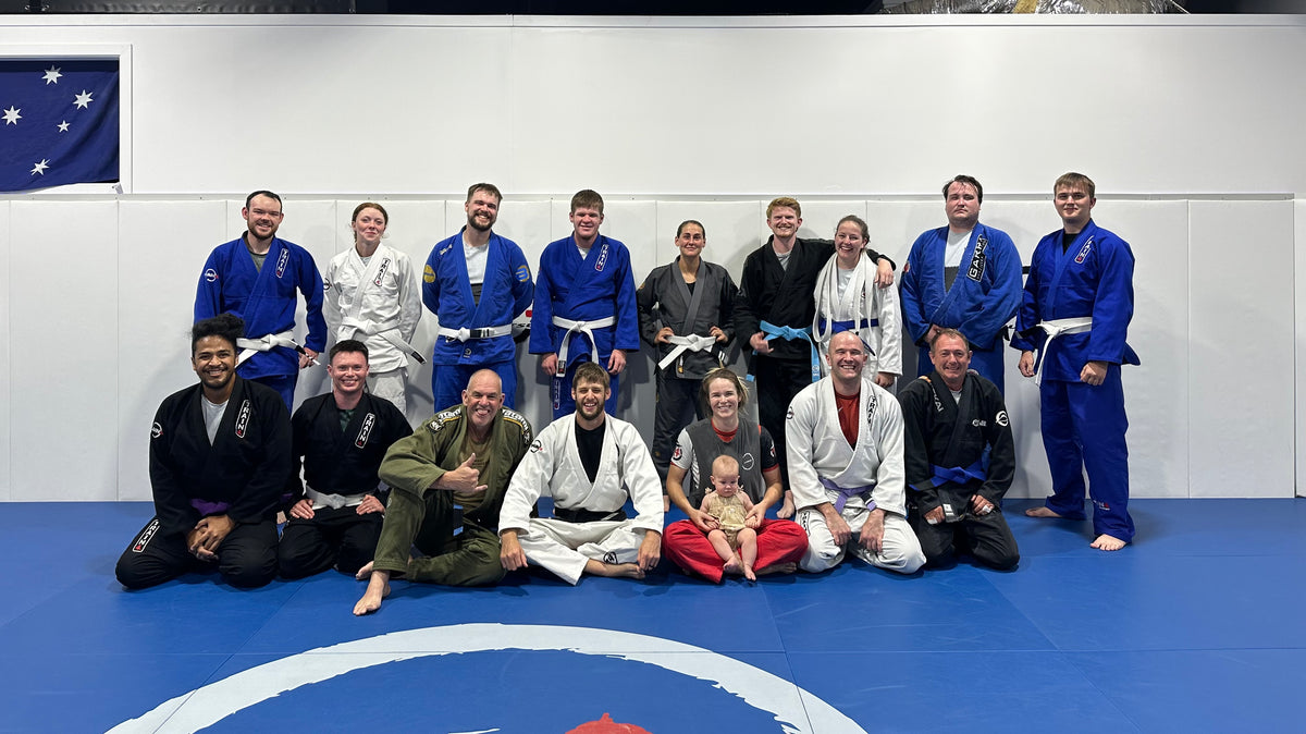 Train4 students and coaches together on the academy mats